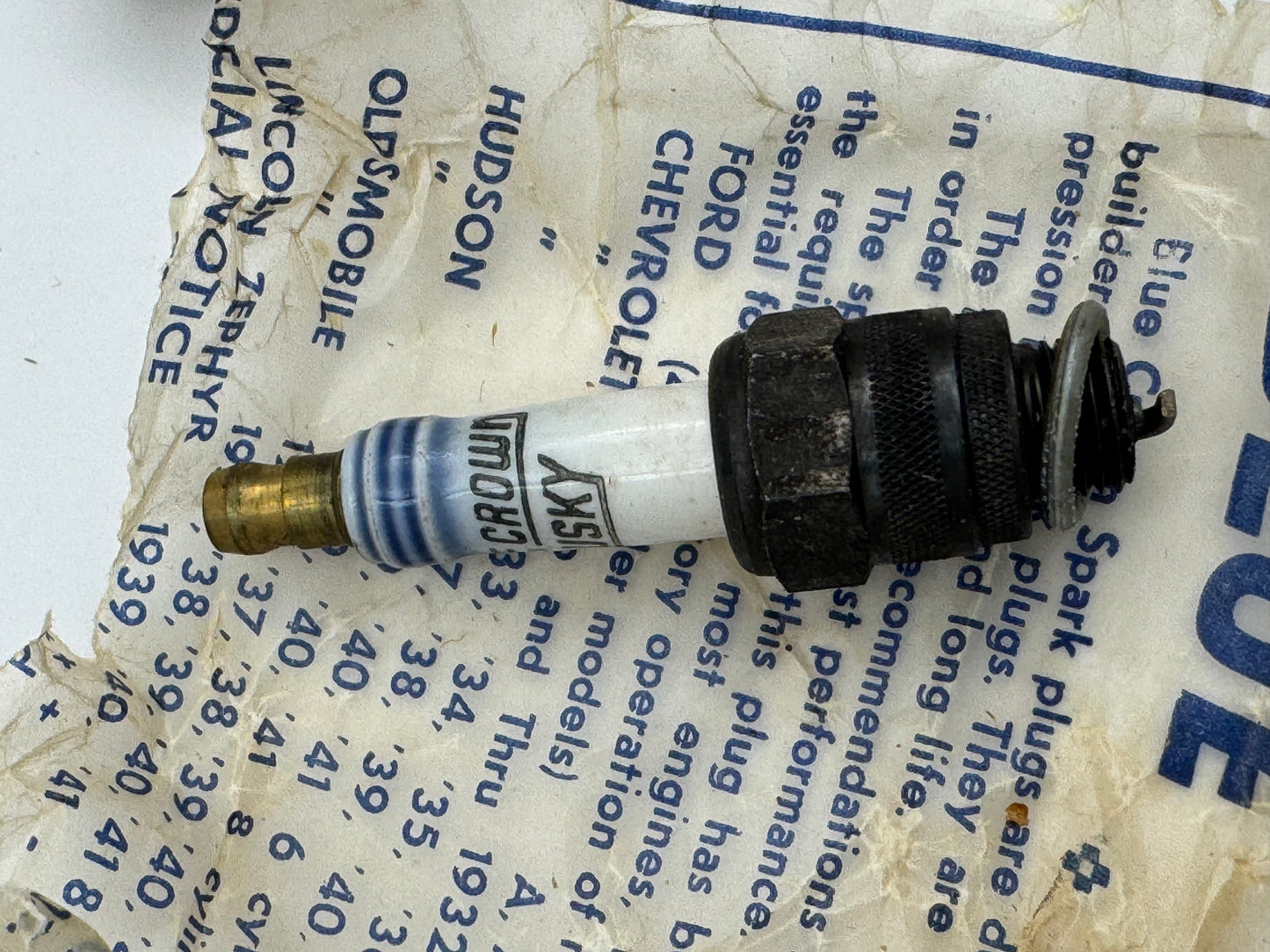Vintage Blue Crown Husky Spark Plug