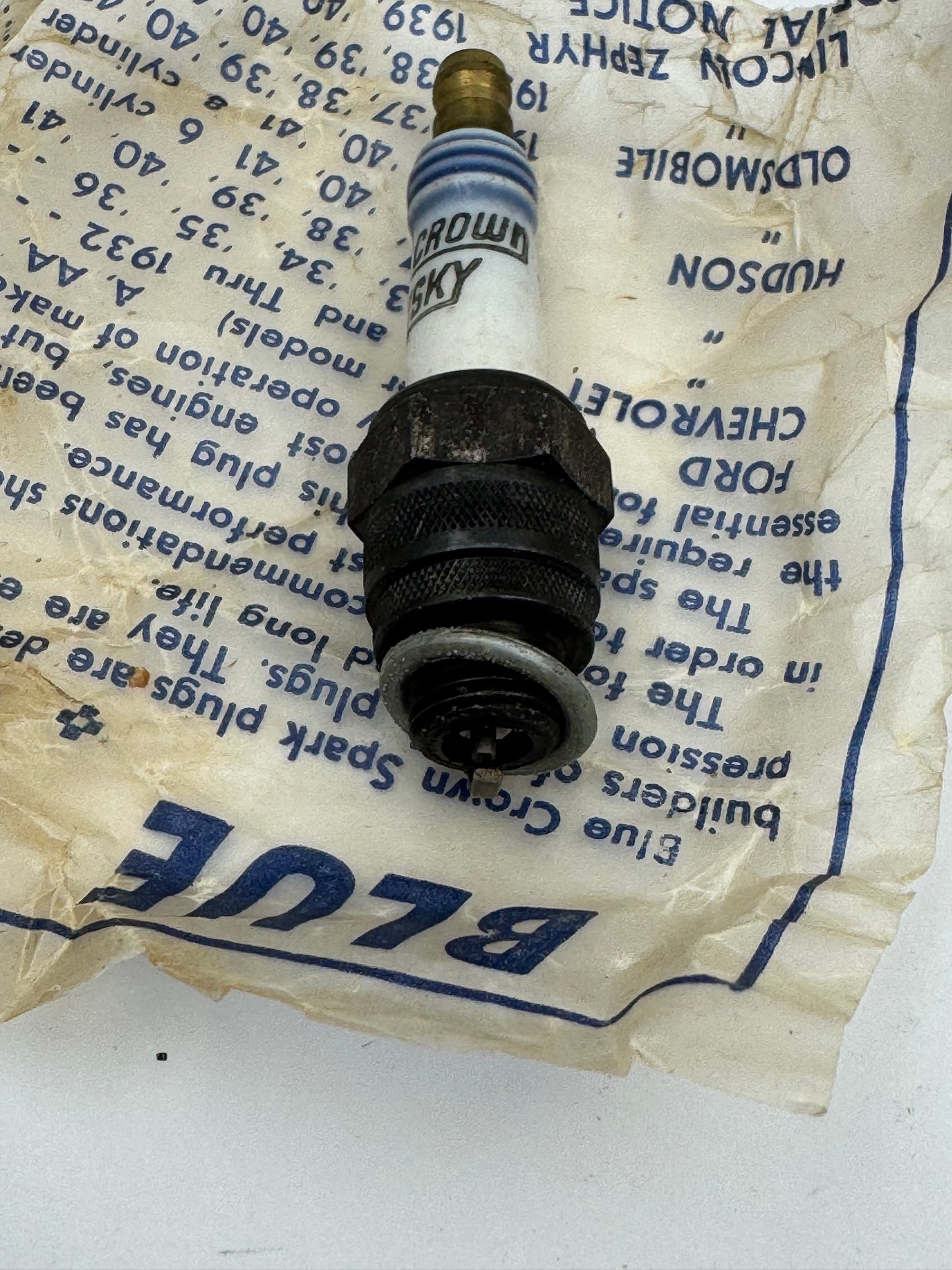 Vintage Blue Crown Husky Spark Plug