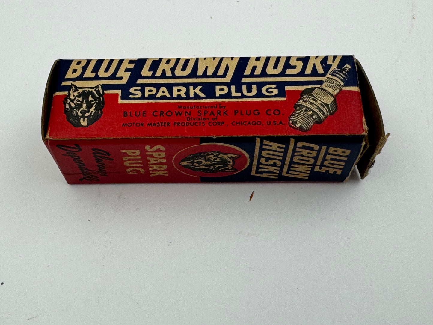 Vintage Blue Crown Husky Spark Plug