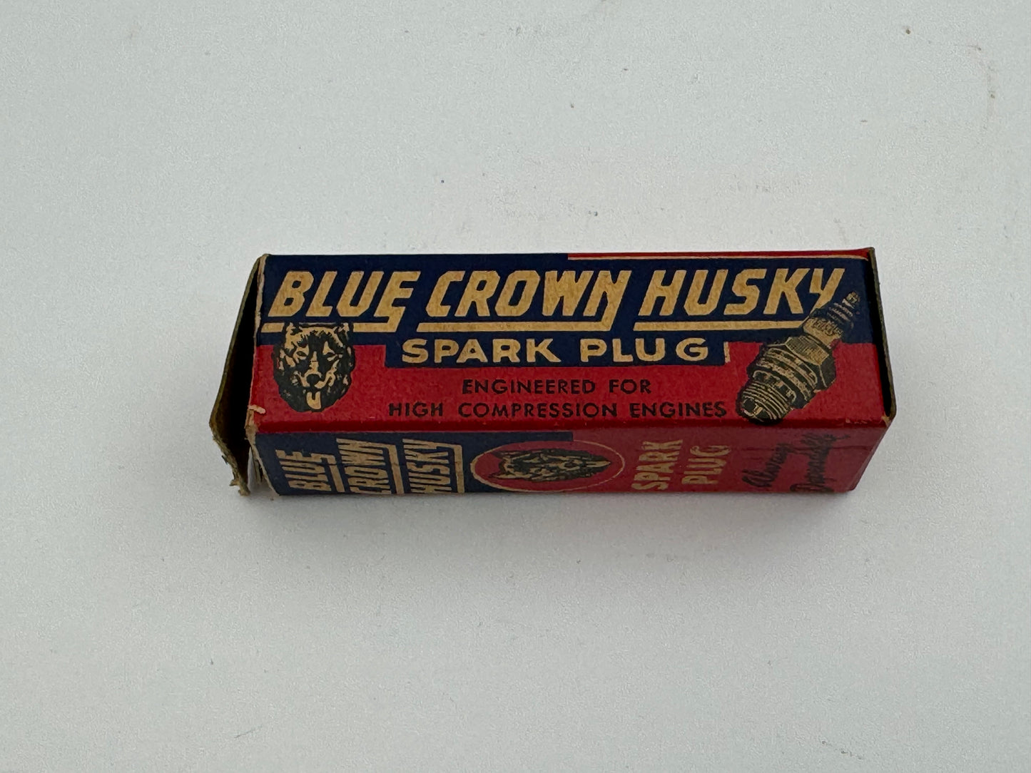 Vintage Blue Crown Husky Spark Plug